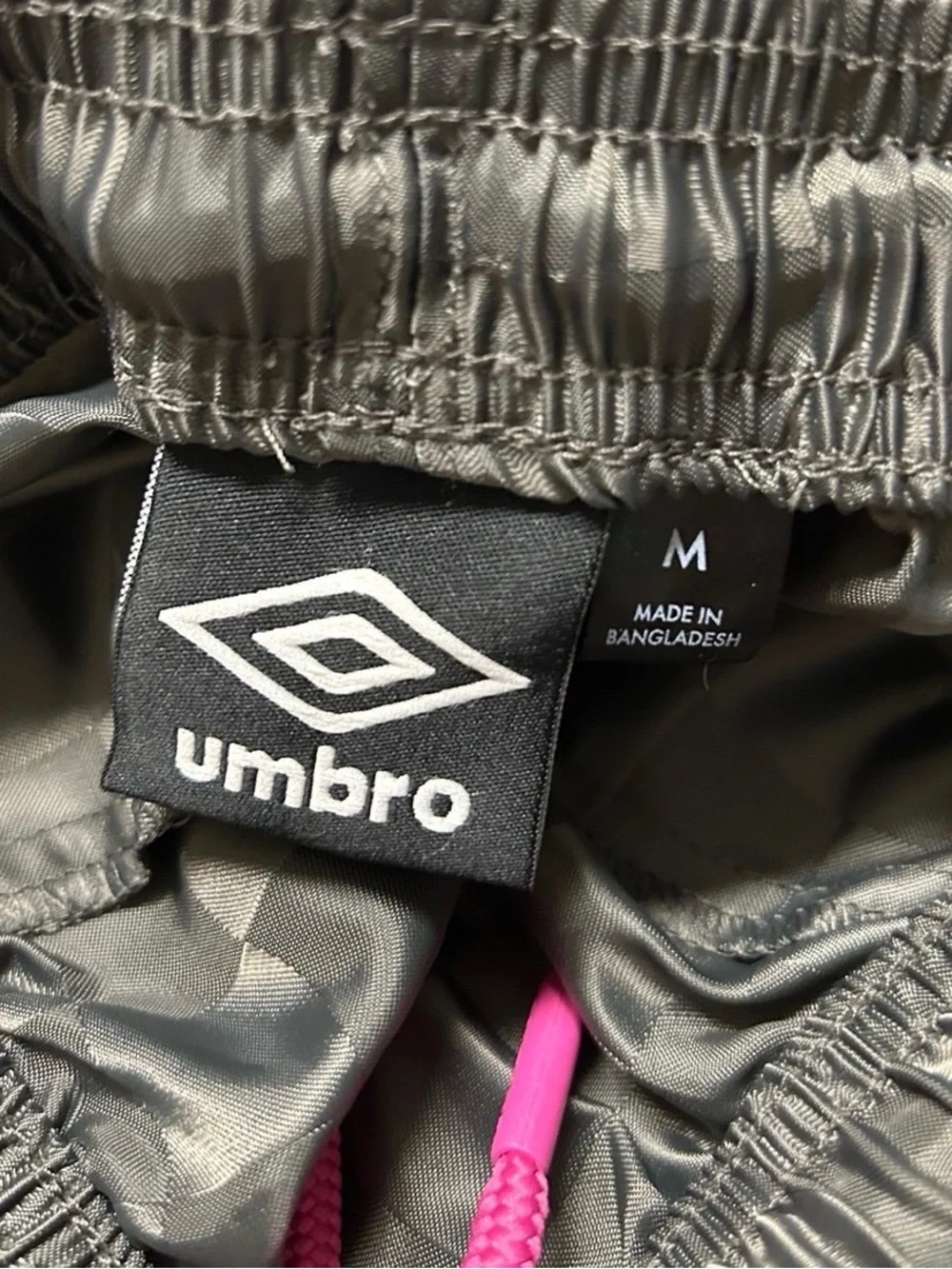 BUNDLE of 4 Umbro boys' athletic  shorts with a embossed retro checkered pattern